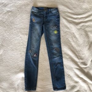 Emoji embroidered jeans